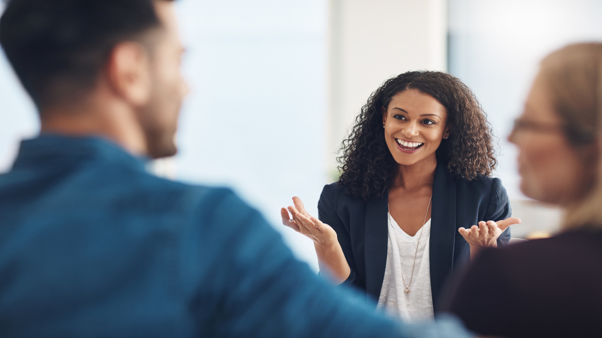 Woman collaborating with class participants